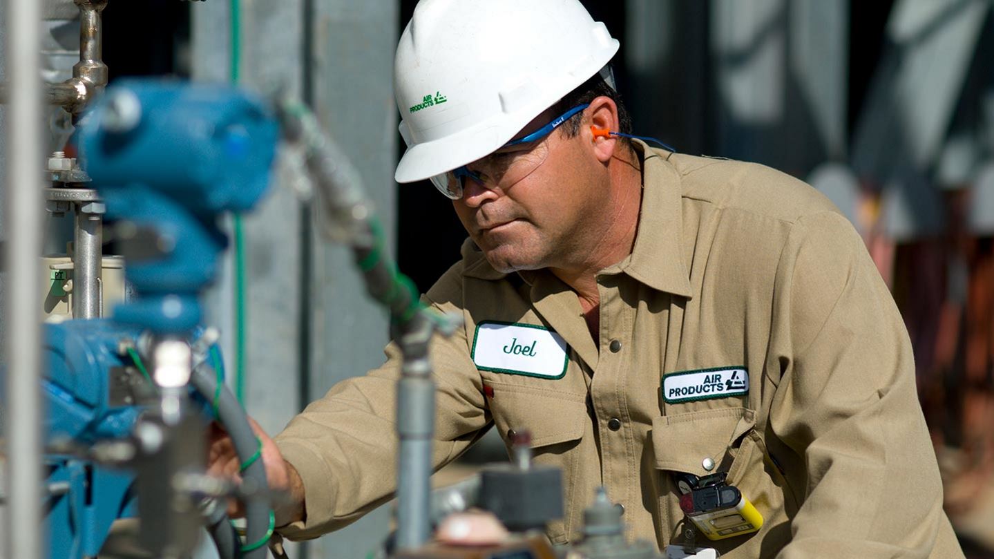 Engineer working outside at plant